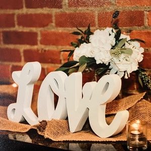 White wooden “Love” sign
